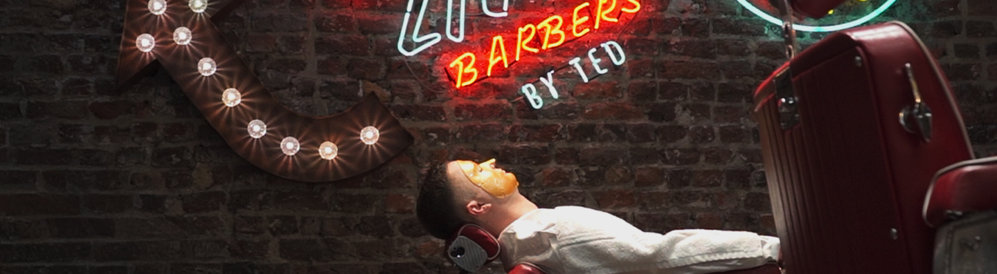 Gold face mask treatment at Ted's Grooming Room